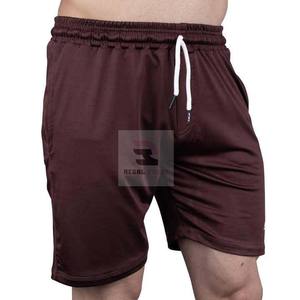 Pantalones cortos atléticos para hombre con cintura elástica Pantalones cortos de estilo casual de patrón sólido transpirable con bolsillos - Product Image 3