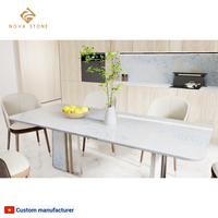 Table à manger en pierre de projet haut de gamme, aspect onyx, luxe, dalle bleue, motif floral, résistant à la corrosion, plateau en quartz haute densité