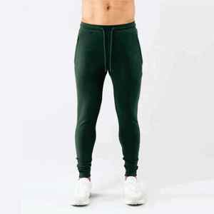 Logo privé vente en gros sweat à capuche 100% coton pantalon jeunesse polaire pantalons de survêtement pantalons joggeurs pour la course et l'entraînement d'hiver - Product Image 1