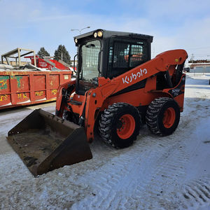 รถตักล้อยาง Kubota SSV75 พร้อมระบบ Quick Attach ห้องโดยสารแบบปิดพร้อมระบบทำความร้อน/ปรับอากาศ เครื่องยนต์ดีเซล - Product Image 1
