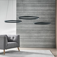 Luminaires et lustres design suspendus en laiton LED modernes de luxe dorés, style industriel simple nordique pour salon