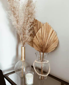 Decoración colgante de pared de hoja de palma natural hecha a mano por artesanos para espacios de vida bohemios y rústicos - Product Image 3