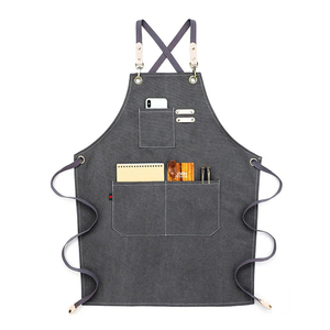 Delantal de trabajo de lona con hebilla ajustable y logotipo personalizado de alta resistencia con bolsillo para herramientas de cocina - Product Image 1