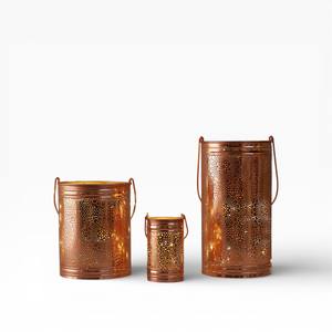 Ensemble de bougeoirs modernes en métal finition cuivre avec découpes géométriques et florales variées - Product Image 3