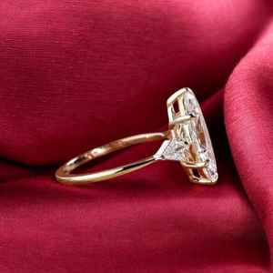 แหวนหมั้นเพชรโมอิสซาไนต์ทรงมาร์ควิส 2.0 กะรัต ธรรมชาติ สีใส เงินแท้ 925 ชุบทอง 14K ดีไซน์เรียบหรู สำหรับงานแต่งงาน - Product Image 6