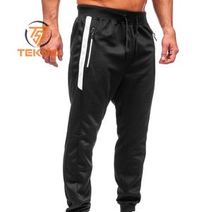 Pantalon de survêtement ample à empiècements pour hommes, logo et taille personnalisés Pantalon de survêtement droit de couleur unie Pantalon de survêtement évasé Bootcut - Product Image 3