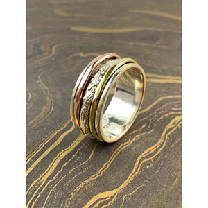 Three Tone Gold Stainless Steel <b>Spinner</b> <b>Ring</b> Fashionable 8.1 Grams Inlay Setting 18K Gold Plated Simple Eternity Style - Product Image 1
