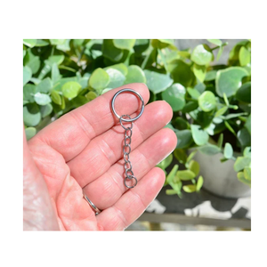 Venta al por mayor de acero inoxidable llavero mosquetón regalo llavero con forma redonda y pulido a mano - Product Image 1