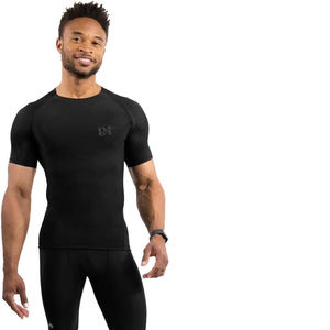 Camisa de compresión de media manga ajustada para hombre con tejido de punto transpirable y ecológica para entrenamiento - Product Image 5
