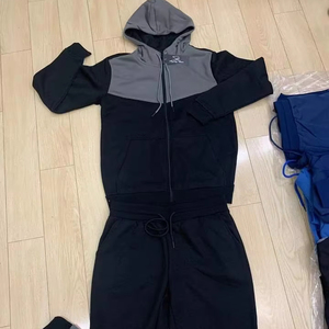 ชุดวอร์มผู้ชายขายดี ดีไซน์เรียบง่าย ระบายอากาศได้ดี ชุดลำลอง ชุดกีฬา แจ็คเก็ตซิปไนลอน และกางเกงทรงเข้ารูปสำหรับผู้ชาย - Product Image 1