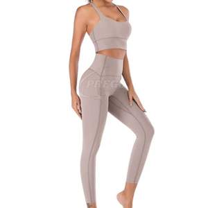 Ensemble de sport pour femme 2026, respirant, taille haute, débardeur court, short, logo frontal, motif uni, ensemble de yoga pour la course à pied, nouveau design - Product Image 1