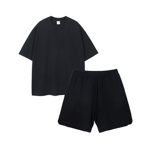 Fabricante de ropa de verano con logotipo personalizado para exteriores, ropa corta para hombre, traje de color puro, camiseta de dos piezas para adultos, conjunto de pantalones cortos - Product Image 1