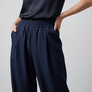Pantaloni fluidi a lunghezza 7/8 con elastico in vita e tasche, taglia unica, adatti alle taglie 38–44 - Product Image 3