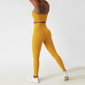 Conjunto de Yoga de alta calidad para mujer, mallas deportivas sin costuras con logotipo personalizado y sujetador, Top liso de compresión con patrón sólido - Product Image 5