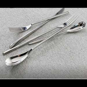 ชุดช้อนส้อมสแตนเลสสีทองดีไซน์หรูสำหรับงานแต่งงานชุดเครื่องใช้บนโต๊ะอาหารทำจากเหล็กกระจกดีไซน์แบบราชวงศ์ - Product Image 3