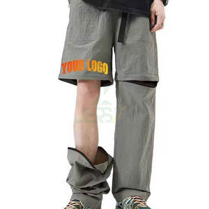 กางเกงกันลมผ้าฝ้ายแบบลำลองสำหรับผู้ชายกางเกงวิ่งแบบซักได้น้ำหนักปานกลางมีซิปป้องกันรอยย่นแห้งเร็วออกแบบได้ตามต้องการ - Product Image 1