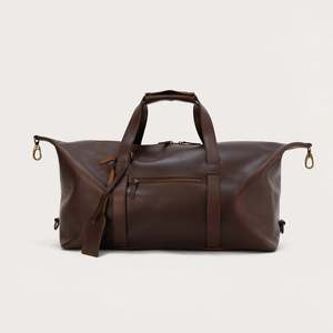 Bolsa de Lona de Cuero Marrón Dale con Cierre de Cremallera de 7 Pulgadas, Estilo Deportivo y a la Moda - Product Image 1