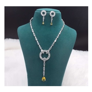 Ensemble collier et boucles d'oreilles de luxe en laiton scintillant AD traditionnel et moderne pour mariages et événements à vendre - Product Image 1