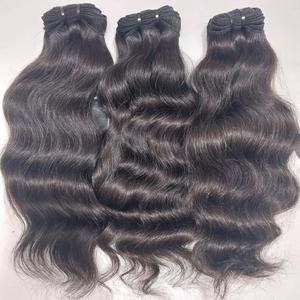 Venta al por mayor 100% Natural indio Remy extensiones de cabello negro Bodywave cabello virgen rizo italiano suelto onda profunda tejido crudo - Product Image 1