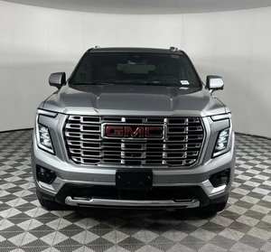 GMC Yukon XL Denali AWD 2025 Argent Métallisé Sièges en Cuir Démarrage à Distance Jantes Chromées Navigation Bluetooth Troisième Rangée de Sièges Gauche - Product Image 1