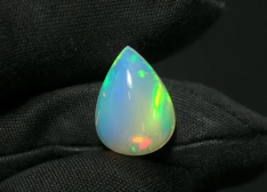 Mehrajudin <b>Gems</b> AA High Quality 4.75 CT Ethiopian Natural White Pear-Shape Cabochon Opal <b>Stone</b> with Multi Flashy <b>Fire</b> - Product Image 2