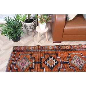 Tapis vintage 2,6x9 pieds, tapis turc en laine orange et noir à bordures - Product Image 1