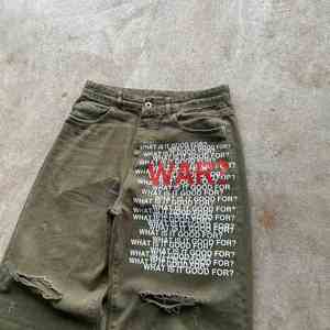 กางเกงยีนส์เอวสูงทรงแบ็กกี้ สไตล์วินเทจฟอกสี ขาดๆ แต่งกระดุม ทรงขาบาน สตรีทแวร์ฮิปฮอป - Product Image 2