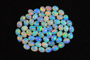 Gema de Ópalo Etíope Genuino, Tamaño 7x5mm, Forma Ovalada, Welo, Brillante, Arcoíris, Gemas de Ópalo Etíope - Product Image 3