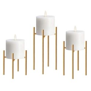 Bougeoir moderne réversible à quatre pattes en métal doré brillant décoratif de table pour la décoration de Noël à la maison - Product Image 1