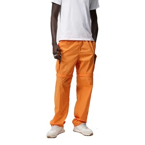 Pantalones cargo de corte recto holgados de material de nailon de Color naranja con estilo para hombre recién llegado con cintura elástica a la venta en MOQ bajo - Product Image 1