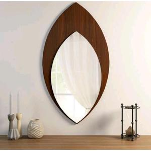Cadre de miroir en bois tendance et élégant avec un design sculpté unique pour rehausser la décoration moderne de la maison, disponible chez Rana Overseas Inc. - Product Image 1