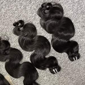 Venta al por mayor 100% Virgen vietnamita trama de pelo crudo de alta calidad onda del cuerpo Color claro gran Stock modelo de cinta - Product Image 5