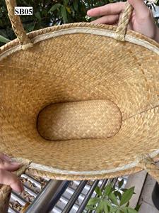 กระเป๋าถือหญ้าทะเลทาสีธรรมชาติ/ กระเป๋าหัตถกรรมทําจากหญ้า เป็นมิตรกับสิ่งแวดล้อมและแฟชั่นจากเวียดนาม - Product Image 4