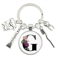 Alphabet de brosse à dents personnalisé porte-clés cabochon pendentif nouveau design assistant dentaire cadeau mode en métal pour les soins dentaires