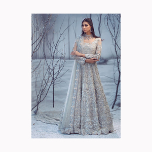 Ensemble Lehenga Choli rose pour bébé enchanteur au design luxueux avec travail Jarkan argenté en tissu filet élégant - Product Image 2