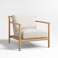 Fauteuil de salon scandinave moderne et élégant pour salle à manger, avec structure en bois massif, mousse écologique, construction durable, idéal pour appartement et hôtel