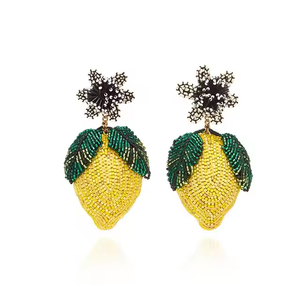 ต่างหูประดับลูกปัดสีฟ้าทำมือ ต่างหูทรงโบฮีเมียนแบบห้อย ดีไซน์เก๋ไก๋สำหรับผู้หญิงจากอินเดีย - Product Image 5