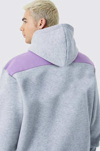 โรงงานผลิตเสื้อผ้า OEM รับผลิตเสื้อฮู้ดดี้และกางเกงขายาวพิมพ์ลายโลโก้ 3 มิติแบบนูน  ชุดเซ็ตสองชิ้นผ้าฟลีซตัดต่อสี  ไซส์ XXL สำหรับฤดูหนาว - Product Image 3