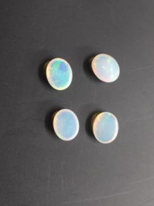 Pierre précieuse d'opale éthiopienne naturelle 11x9mm Cabochon ovale avec effet de jeu de couleur/effet de feu pour la fabrication de bijoux - Product Image 3