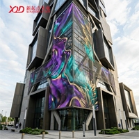 Écran LED RGB souple et étanche en maille transparente pour façades architecturales et solutions d'affichage sur rideaux de bâtiment
