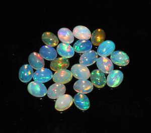 24-Piece 13.60 Carats Ethiopian Opal Cabochons Natural Ovals 5x7mm Loose Gemstones Oval Cut - Product Image 1