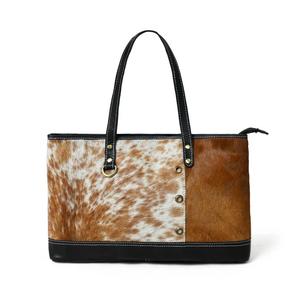Ce fourre-tout en cuir de vachette est un sac à main élégant pour femmes qui est un excellent choix pour un look tendance - Product Image 1