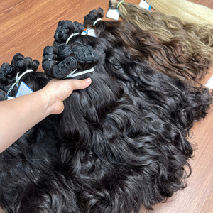 Extensiones de cabello humano vietnamita crudo de trama ondulada natural disponible en stock - Product Image 1