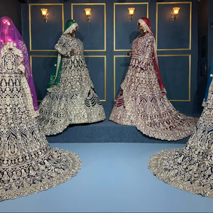 Taaj Velvet Lehenga con Full Heavy Big Trail Sparkling Jarkan Stones y Heavy Work Perfecto para celebraciones de bodas - Product Image 1