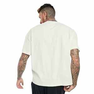 เสื้อยืดโอเวอร์ไซส์ผู้ชาย ผ้าคอตตอน 100% หนัก 240GSM รับผลิตตามสั่ง พร้อมสกรีนโลโก้ OEM - Product Image 2
