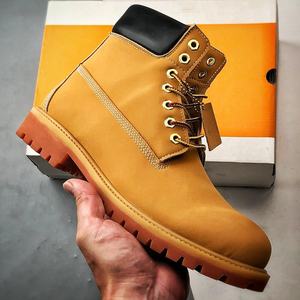 Bottes de randonnée jaunes en cuir véritable imperméables et antidérapantes pour hommes et femmes, bottes de sécurité de luxe de créateur pour toutes les saisons - Product Image 1