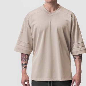เสื้อยืดโอเวอร์ไซส์ คอวี ทรงหลวม สไตล์อเมริกันฟุตบอล เหมาะกับฤดูร้อน แขนเสื้อแบบดรอปไหล่ สตรีทแวร์ สีพื้น - Product Image 6