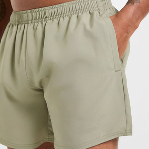 Forte demande Logo personnalisé doublé double couche poches Sports athlétiques 5 pouces entraînement d'entraînement 2 en 1 Top des ventes de shorts de sport pour hommes - Product Image 4