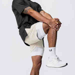 Fábrica OEM alta calidad logotipo personalizado transpirable poliéster Activewear entrenamiento pantalones cortos hombres correr deportes hombres gimnasio pantalones cortos - Product Image 1