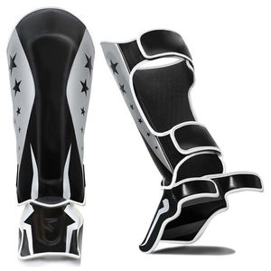 Espinilleras de Artes Marciales Mixtas (MMA) en Color Blanco y Negro, de Cuero PU, con Logotipo Personalizado, Nuevo Modelo, para Kickboxing, Muay Thai y Stand-Up - Product Image 1